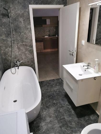 Apartament cu 2 camere decomandat în Chinteni