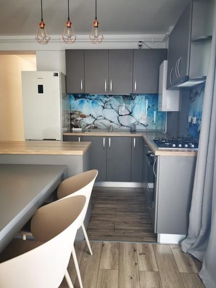Apartament cu 3 camere decomandat, mobilat în Borhanci