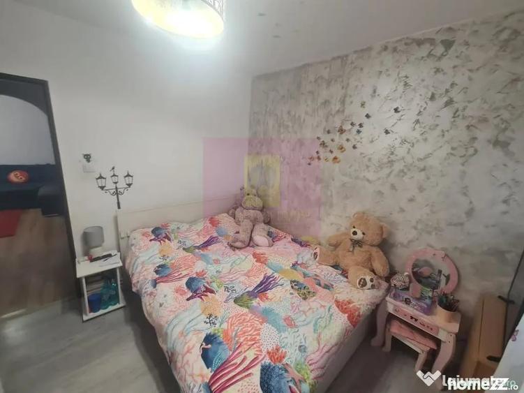 Apartament cu 3 camere semidecomandat în Cuza