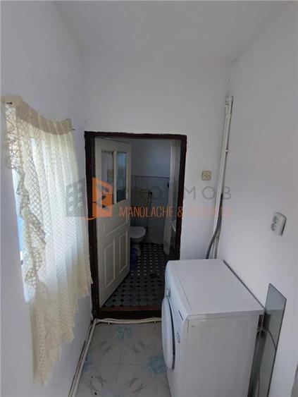 Casă individuală cu 7 camere cu Canalizare în 1 Decembrie