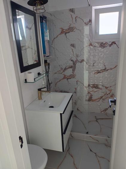 Apartament cu 4 camere semidecomandat în Central