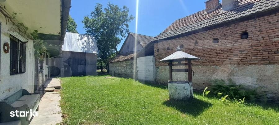 Casă cu 2 camere cu Teren 3000 Mp în Hârseni