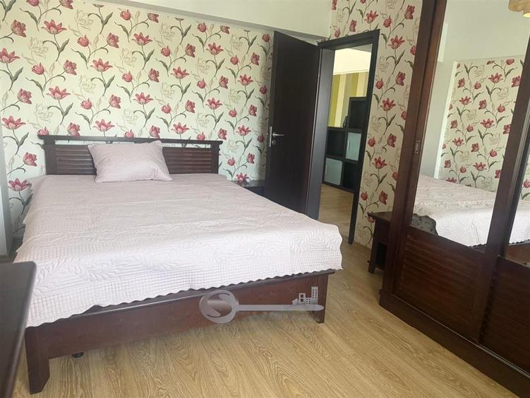 Apartament cu 2 camere semidecomandat, mobilat în Podul de Fier