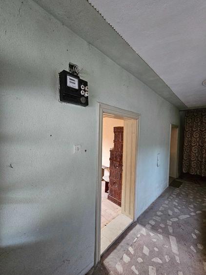 Casă cu 4 camere decomandat în Buntești