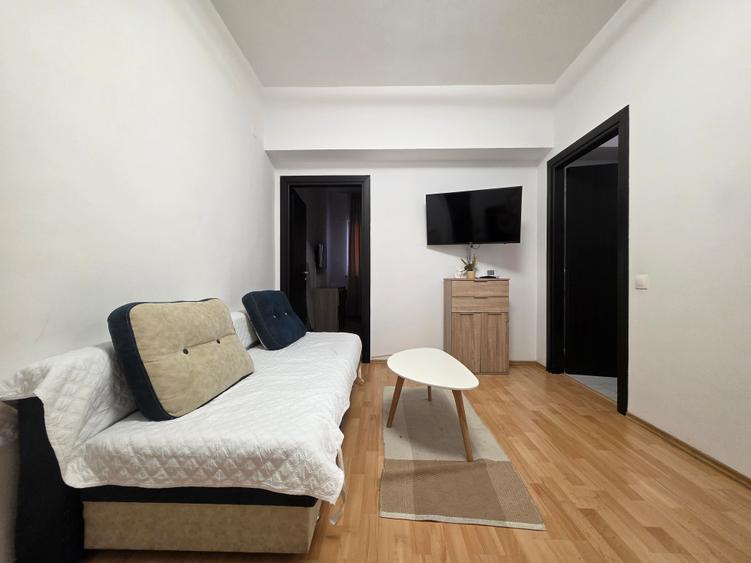 Apartament cu 2 camere semidecomandat în P-ța Universității