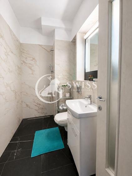 Apartament cu 2 camere semidecomandat, mobilat în Central