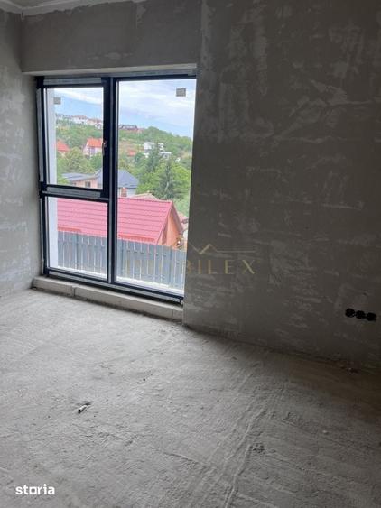 Casa individuala cu 4 camere + Garaj , zona linistita - 18