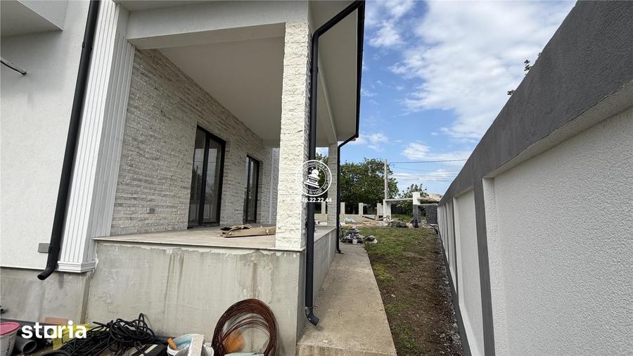 Casă cu 6 camere cu Teren 750 Mp în Aroneanu