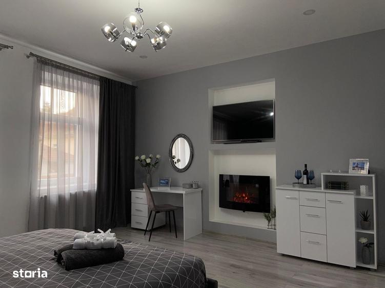 Apartament cu 2 camere, mobilat în Central