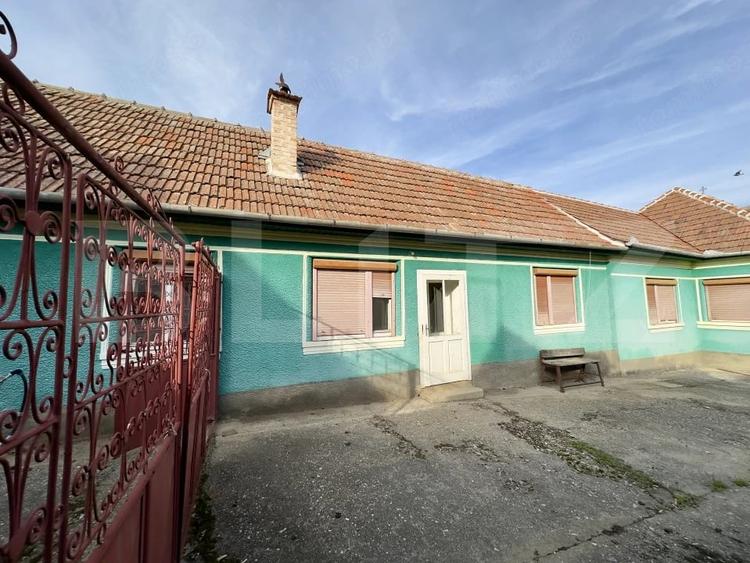 Casă cu Teren 1220 Mp în Central