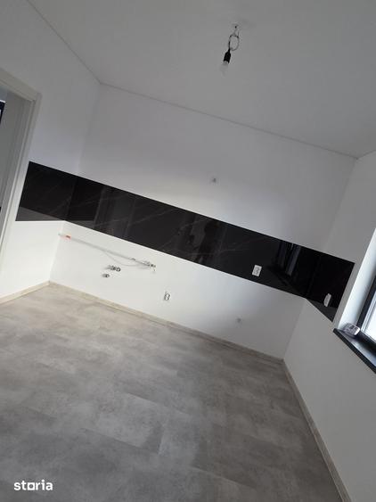 Casă cu 4 camere cu Teren 510 Mp în Holboca