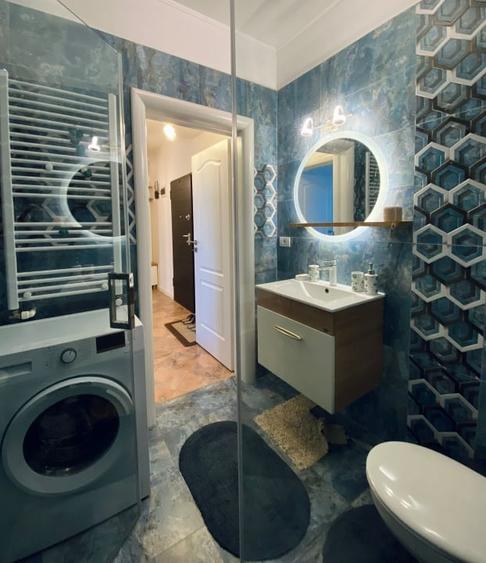 Apartament cu 2 camere semidecomandat, mobilat în Central