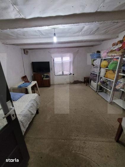 Casă cu 2 camere cu Teren 480 Mp în Plopi