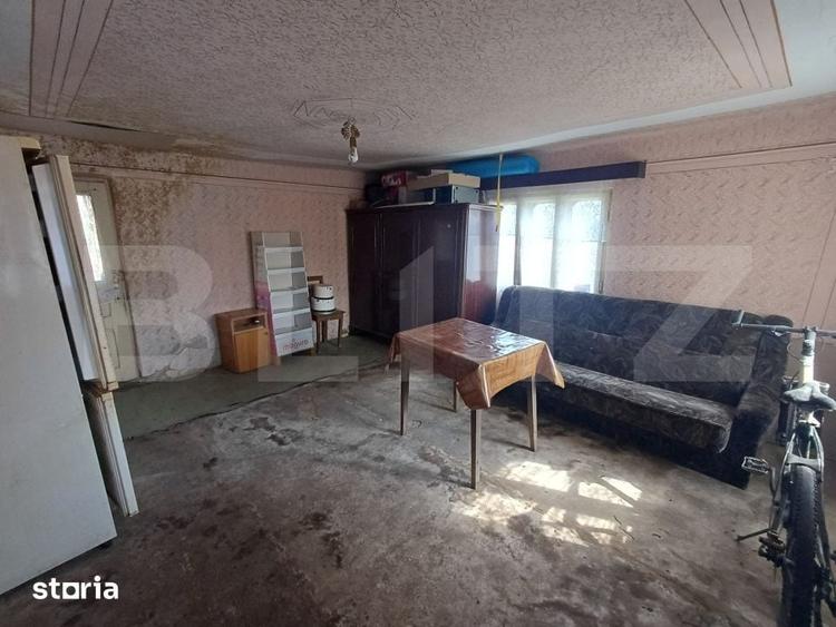 Casă cu 3 camere cu Teren 1000 Mp în Arcani