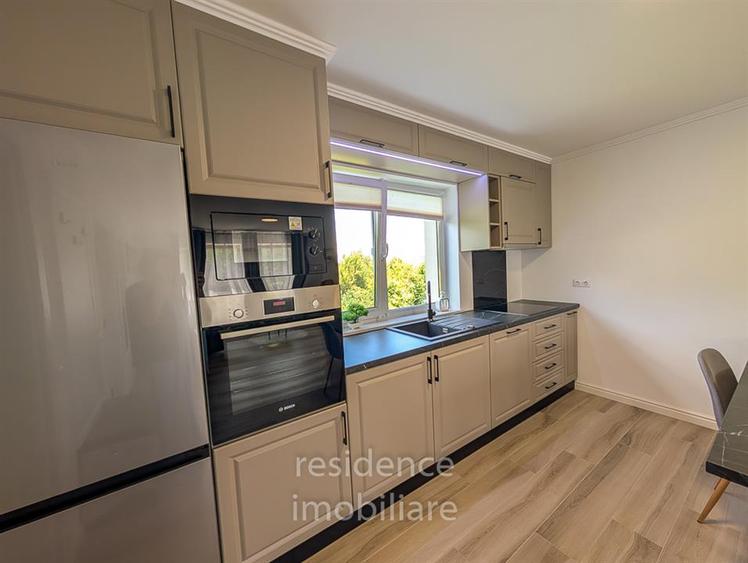 Apartament cu 4 camere semidecomandat, mobilat în Borhanci