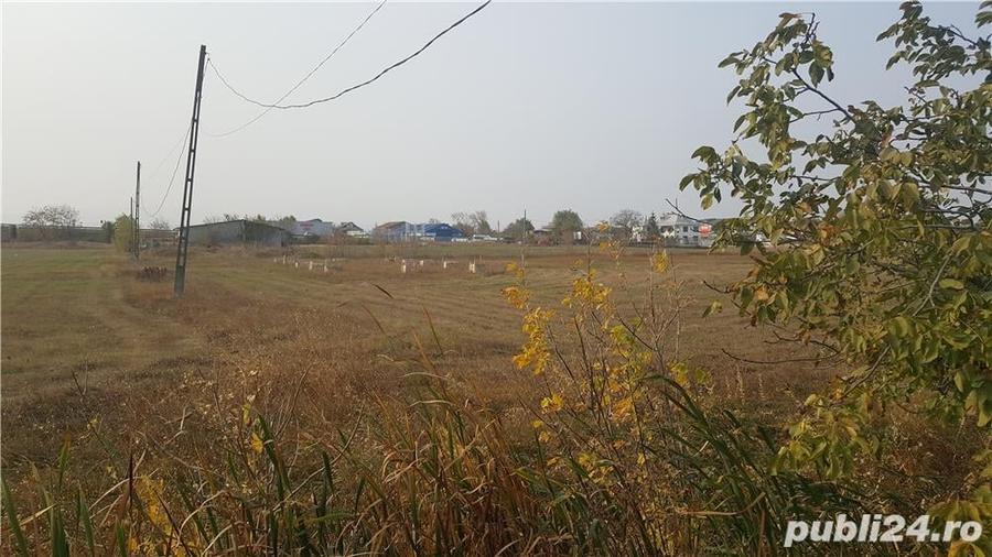 Vand inchiriez intravilan Golesti,la 3 km de Focsani, 23 m deschidere DN2 E85,17euro mp - 3