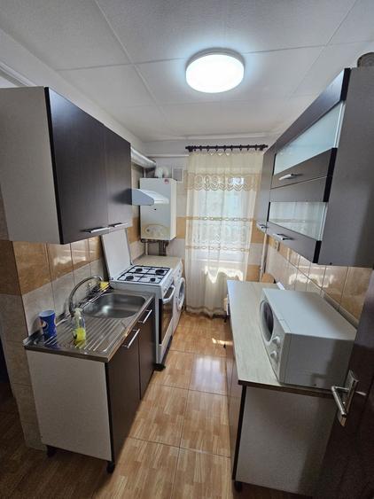 Apartament cu 2 camere decomandat în Podu Roș