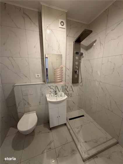 Apartament în Rontău