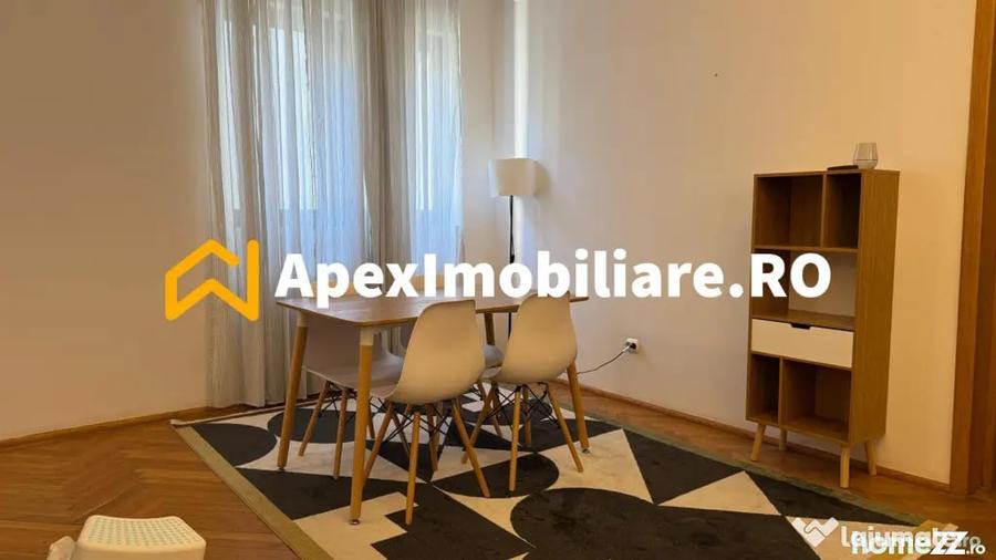 Apartament cu 3 camere semidecomandat, mobilat în Universitate
