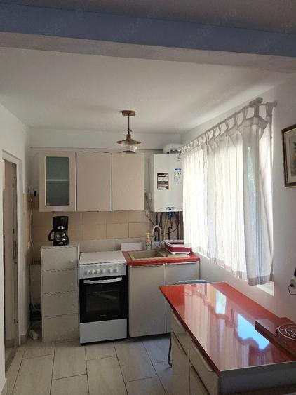 Casă cu Teren 100 Mp în Bucium
