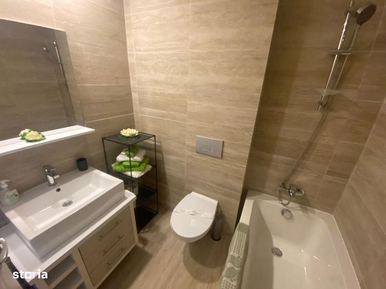 COSMOPOLIS - Apartament Tip studio cu 123 mp gradina,complet mobilat - 1