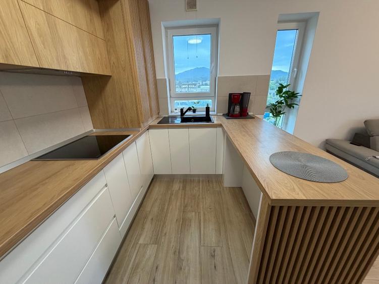 Apartament cu 2 camere decomandat în Tractorul