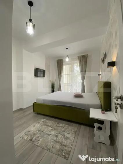 Apartament cu 2 camere semidecomandat, mobilat în Central