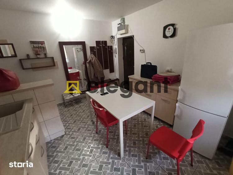 Apartament cu 3 camere semidecomandat, mobilat în Calea București