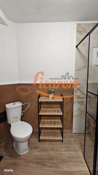 Apartament cu 4 camere în Răcădău
