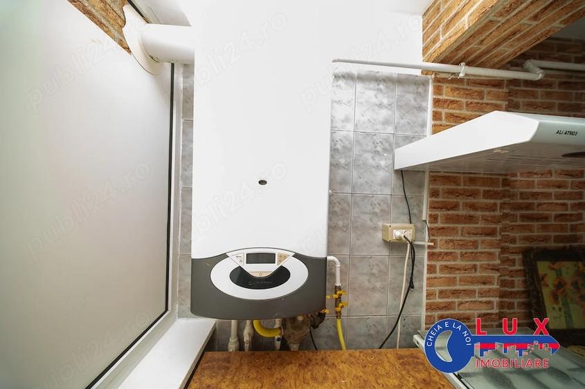 Apartament cu 3 camere decomandat în Spitalului