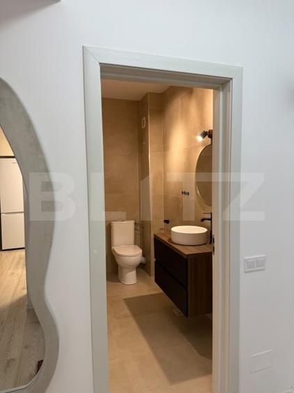 Apartament cu 2 camere semidecomandat, mobilat în Florești