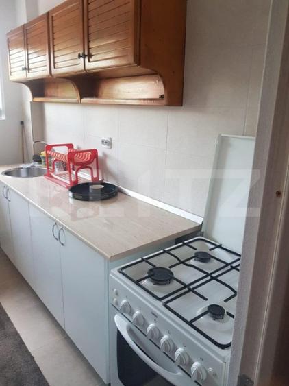 Apartament cu 2 camere semidecomandat, mobilat în Central