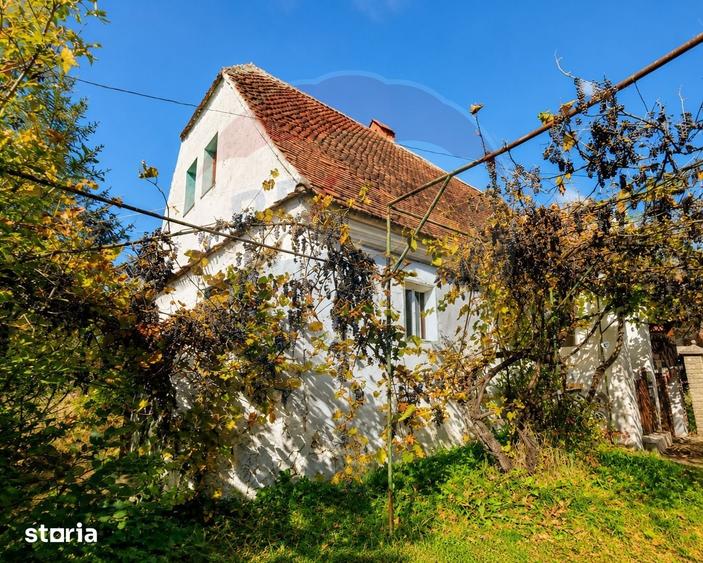 Casă cu 3 camere cu Teren 1646 Mp în Bicfalău