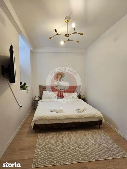 Apartament cu 4 camere decomandat în Romană