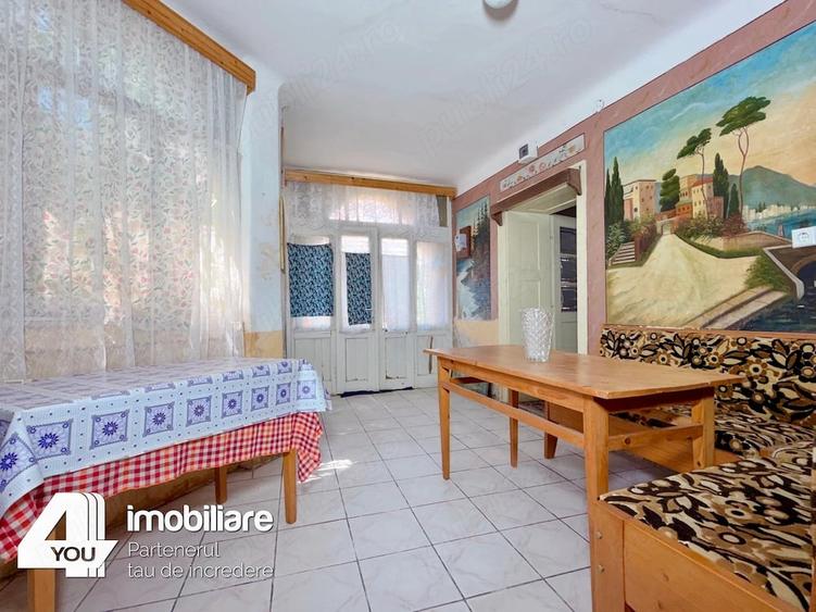 Casă cu 4 camere cu Teren 1459 Mp în Secusigiu
