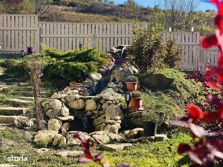 Casă cu 4 camere decomandat în Borhanci