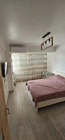 Apartament cu 3 camere decomandat în Exterior Vest