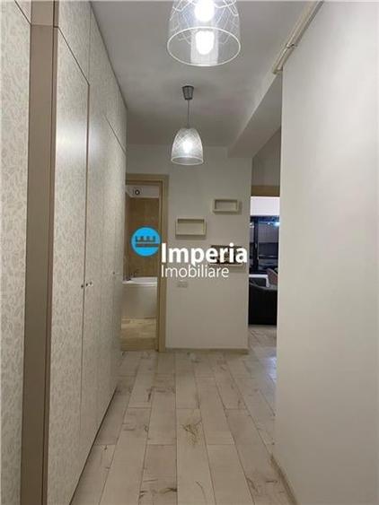 Apartament cu 3 camere decomandat în Podul de Fier