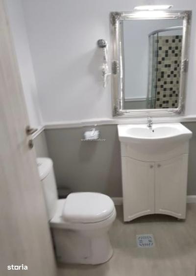 Casă cu Teren 900 Mp în Central