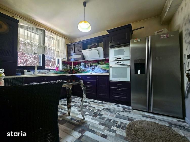 Casă cu 5 camere cu Teren 210 Mp în Tunari