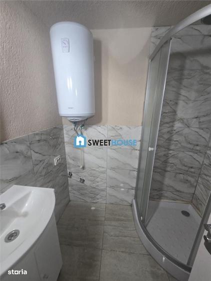 Casă cu 4 camere cu Teren 100 Mp în Cincu