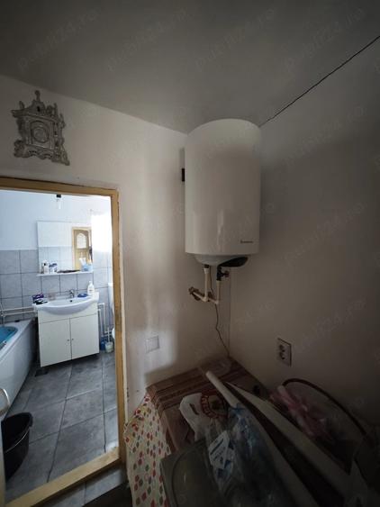 Casă cu 2 camere cu Teren 1800 Mp în Ungheni
