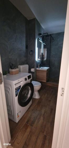 Apartament cu 2 camere semidecomandat, mobilat în Centrul Civic