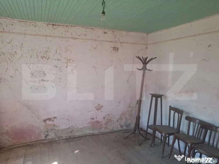 Casă cu 2 camere cu Teren 5000 Mp în Mogoșani