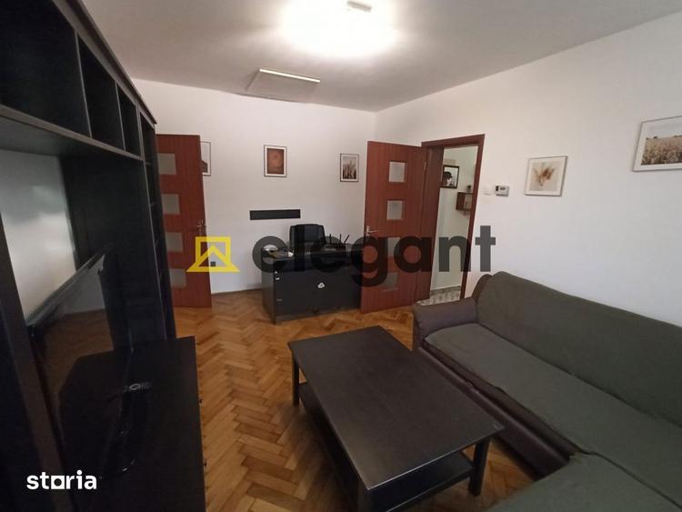 Apartament cu 3 camere semidecomandat, mobilat în Calea București