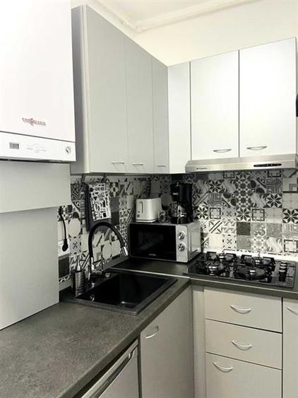 Apartament cu 2 camere semidecomandat, mobilat în Centrul Istoric
