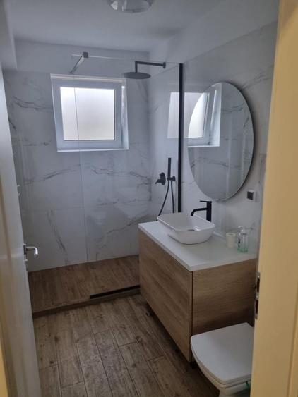Apartament cu 2 camere decomandat în Tractorul