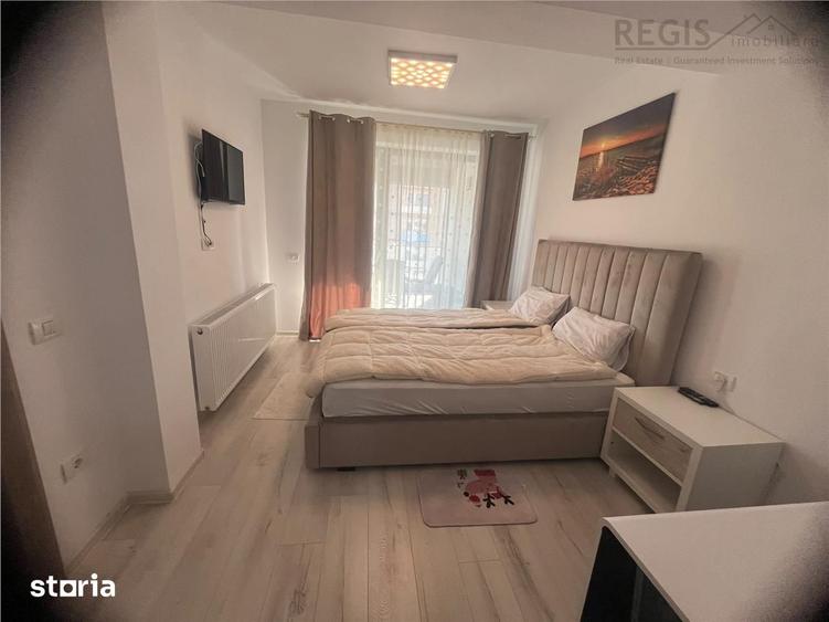 Apartament cu 2 camere semidecomandat, mobilat în Tractorul