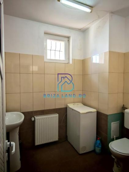 Casă individuală cu 10 camere cu Canalizare în 1 Mai