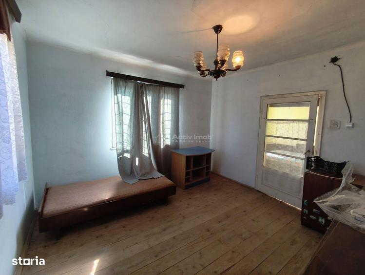 Casă cu 4 camere cu Teren 300 Mp în Muncitoresc